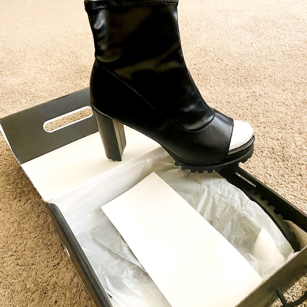 Hi! Vegas birthday booties! Were too big. Brand New. Never worn.. ever.